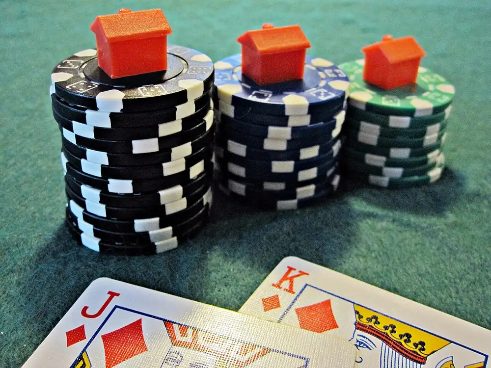 Poker chips stacked in piles - crypto inside bets